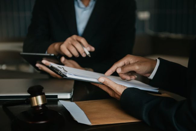 Lawyer and businessman or judge Consult with clients, legal and